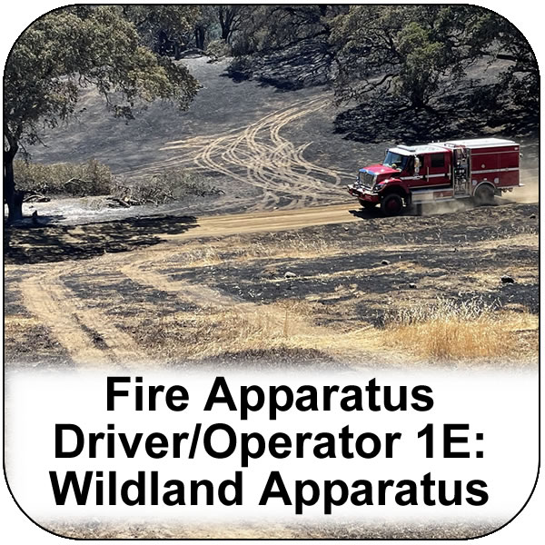 Fire Apparatus Driver Operator 1E: Wildland Fire Apparatus Operations. A red fire engine drives along a road surrounded by burnt vegetation. View course information.