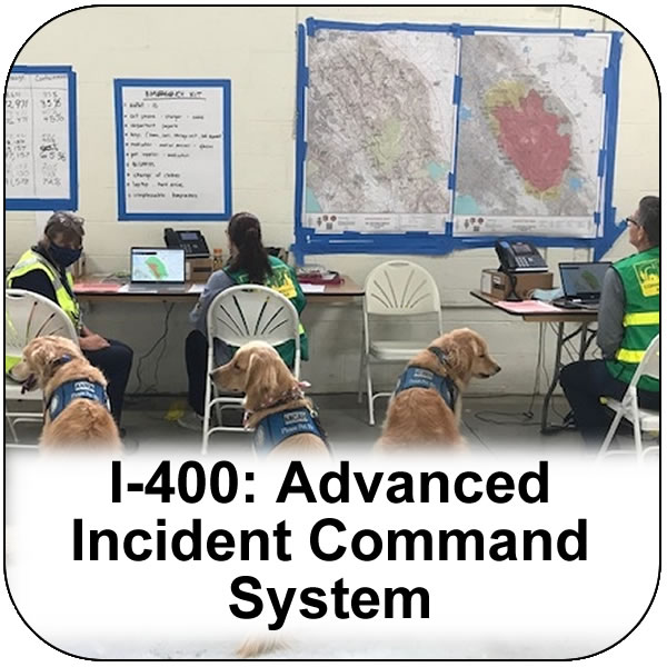 I-400 Advanced Incident Command System (ICS). Three people seated in a call center with maps on the wall and three dogs nearby. View course information.